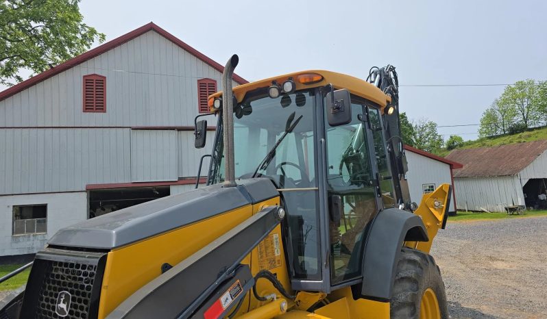 
								2011 DEERE 410J full									