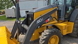 
										2011 DEERE 410J full									