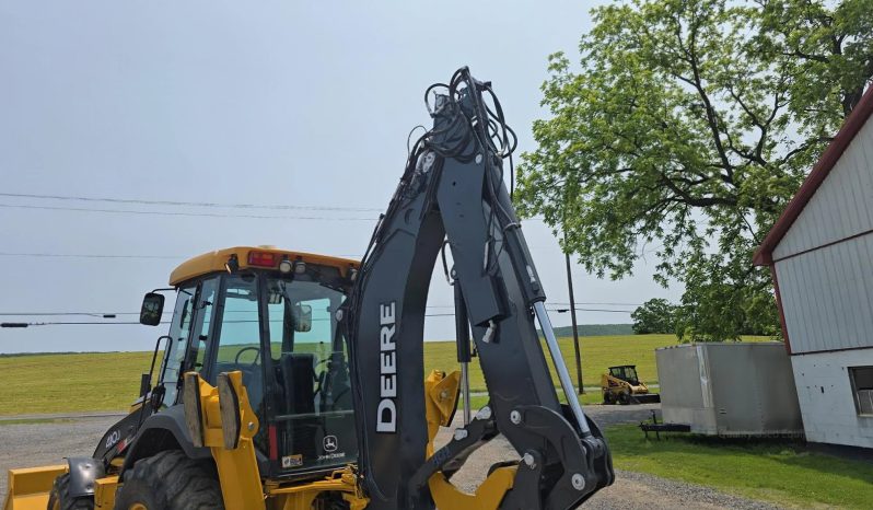 
								2011 DEERE 410J full									